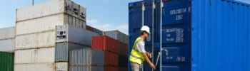 SILVERSEA specialist inspecting a 20ft container in a depot with dry, High Cube and refrigerated units